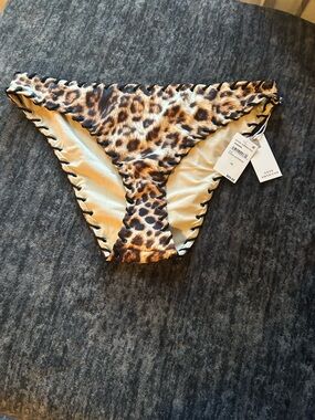 Good American Leopard-Print One-Piece Swimsuit in Brown and Tan